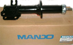 Амортизатор подв. передн. лев. DAEWOO MATIZ масл. (пр-во Mando)